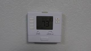 Program Your T705 Programmable Thermostat [upl. by Nahij]