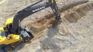 Volvo EW205D Wheeled Excavator promotional video [upl. by Helene51]