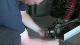 Removing the rear hub and replacing the bearings in the Yamaha Rhino [upl. by Wolfort]