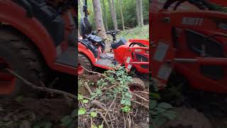 Kioti CS2220 Stuck on a stump and creek bank tractorfails [upl. by Kenleigh]