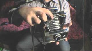 How to Open  Close Polaroid 100 Series Pack Camera [upl. by Drofiar891]