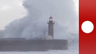 Atlantic storm Huge waves crash into lighthouse in Portugal [upl. by Boniface]