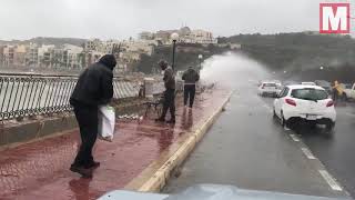 Hundreds of live FISH rain from the sky during mega storm in Malta [upl. by Enajiram85]