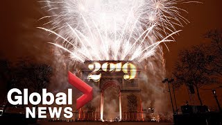 New Years 2019 fireworks illuminate Paris Arc de Triomphe Red Square [upl. by Ocihc]