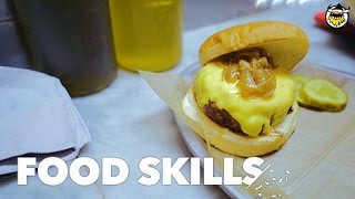 NYCs Best Burger Explained  Food Skills [upl. by Arok]