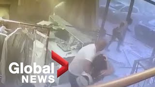 Beirut explosion CCTV footage captures moment shock wave hits local shops [upl. by Necaj]