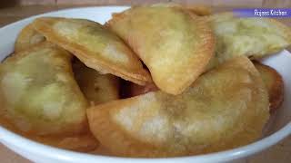 পুলি পিঠা রেসিপি । Puli Pitha recipe । কান মুচড়ি । তেলে ভাজা পুলি পিঠা রেসিপি । [upl. by Nylatsyrc]