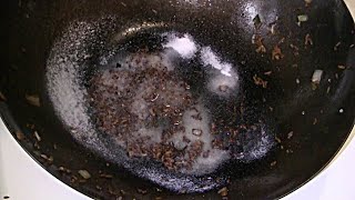 How To Clean A Wok Seasoning And Reconditioning A Wok How To Make Your Wok NonStick [upl. by Hanid796]