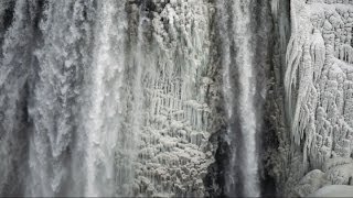 Niagara Falls Canada freezes over  Spectacular photos from 2014 polar vortex [upl. by Ecinaej]