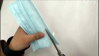 3 PlyLayer surgical mask is cut open to reveal [upl. by Beverie]