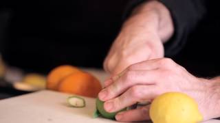 Cutting Lemons and Limes for the Bar  DrinkSkool Bar Techniques [upl. by Lorine]