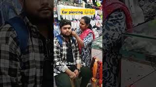 Ear piercing gun shoot youtube video traditional please subscribe [upl. by Avelin]