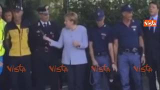 RENZI E MERKEL ALLA FERRARI FOTO CON IL CANE LEO E I VOLONTARI DEL SISMA [upl. by Ivo]