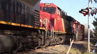 CN 100 Gevo 3894 Leads a Long Empty Potash Train CN 597 Pass Boundary Creek NB at Track Speed [upl. by Anivle]