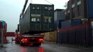 shipping container for sale being loaded on to delivery lorry  wwwbullmanscontainerscouk [upl. by Yarehs901]