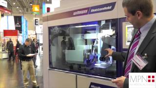 Medical cleanroom two shot micro injection moulding demonstration at Compamed 2012 [upl. by Merrie218]