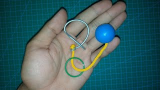 Ring and ball  Cowboys Hobble metal string puzzle solution [upl. by Dlaregztif]