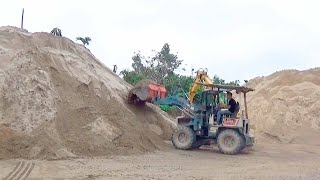 MITSUBISHI WS400 wheel loader scoops sand aggregates excavators dump trucks [upl. by Arbed]