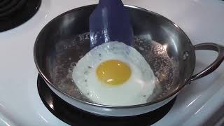 How to Cook Eggs in Stainless Steel Low and Slow Without Sticking [upl. by Ruzich]