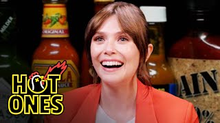 Elizabeth Olsen Feels Brave While Eating Spicy Wings  Hot Ones [upl. by Mendie]