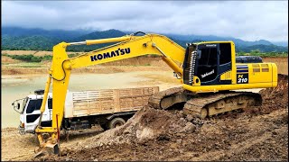 รถขุด KOMATSU PC21010M0 พารถใหม่มาลงงานแก้มลิงกับทีมงานสิบล้อ งานทอยเก็บขอบสันเขื่อน [upl. by Annuaerb197]