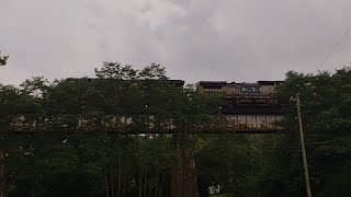 Train Buddies Grey CSX Engine 7868 passes over Bullock Pen Trestle in the rain csxtrains [upl. by Drugi514]