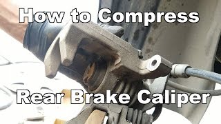 How to Compress Rear Brake Caliper Piston How to Use Brake Caliper Tool [upl. by Zealand710]