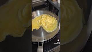 Folded eggs on stainless steel pan [upl. by Eenyaj]