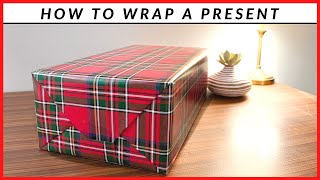 How To Wrap A Present  Simple Wrapping Paper Technique [upl. by Eisle]