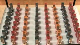 Watch This Amazing Video 64 Metronomes in Perfect Syncronisation [upl. by Ateuqram309]