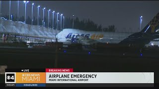 Cargo plane safely lands in Miami International Airport after engine malfunction [upl. by Blasien]