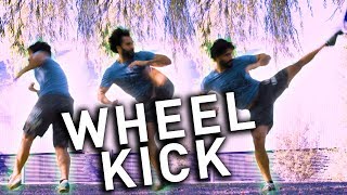 The Spinning Hook Kick Wheel Kick TUTORIAL [upl. by Barnet]