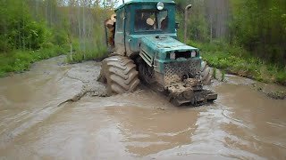 Homemade forwarder logging in wet forest deep water [upl. by Sairahcaz]