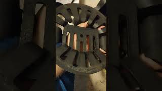 reposition shaker grate on New 1869 potbelly coal stove from United States stove company [upl. by Gwendolen]