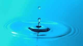 Slow Motion Water Droplet Falling Breaks Surface Tension and Makes Ripples in HD YouTube Video View [upl. by Mad]