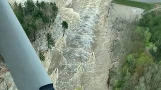 Pilot captures rushing water flowing through failed Edenville Dam [upl. by Bea654]