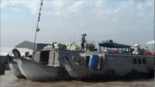 Mekong Delta Vietnam  floating market of Phong Dien [upl. by Ahsimet]