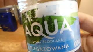 AQUA Woda źródlana niegazowana 05L [upl. by Aikmat]