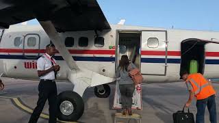 WORLD shortest RUNWAY 2022 Winair Flight St Maarten to Saba Cockpit view Winair DHC6 Twin Otter [upl. by Hcone]