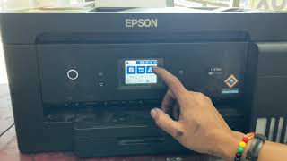 Epson L14150 How to manual nozzle check amp head cleaning [upl. by Auqenet658]