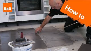 How to tile a floor part 2 laying the tiles [upl. by Cathrine595]