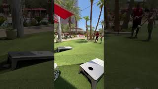 Playing Cornhole in the pool area at the Hilton Conrad Crockfords Casino in Las Vegas [upl. by Aniuqaoj790]