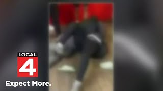 School security caught on video fighting student in Detroit [upl. by Neelav]