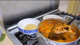 How to make Ghana fresh tilapia and goat meat light soup  Ghana tilapia soup [upl. by Ariamoy]