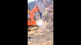 HYDRAULIC BREAKER  HAMMER HS 4500 IN CHINA IRONSTONE QUARRY [upl. by Tuesday]