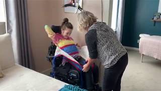 How to use a ceiling lift to transfer a patient from a wheelchair to bed [upl. by Nylirad]