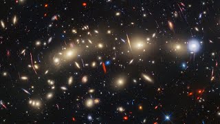 Webb and Hubble telescopes deliver mindboggling view of huge galaxy cluster [upl. by Sirtaeb]