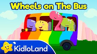 Wheels On The Bus  Dubby Dino  Rainbow Bus  Dinosaur Song for Kids  Nursery Rhymes  KidloLand [upl. by Mota]