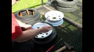 Removing and resetting a 12 in trailer tire [upl. by Adnovahs]