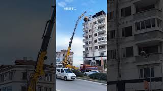 FirstEver Rooftop Excavation Watch How They Did It  excavator rooftop construction engineering [upl. by Keefer]